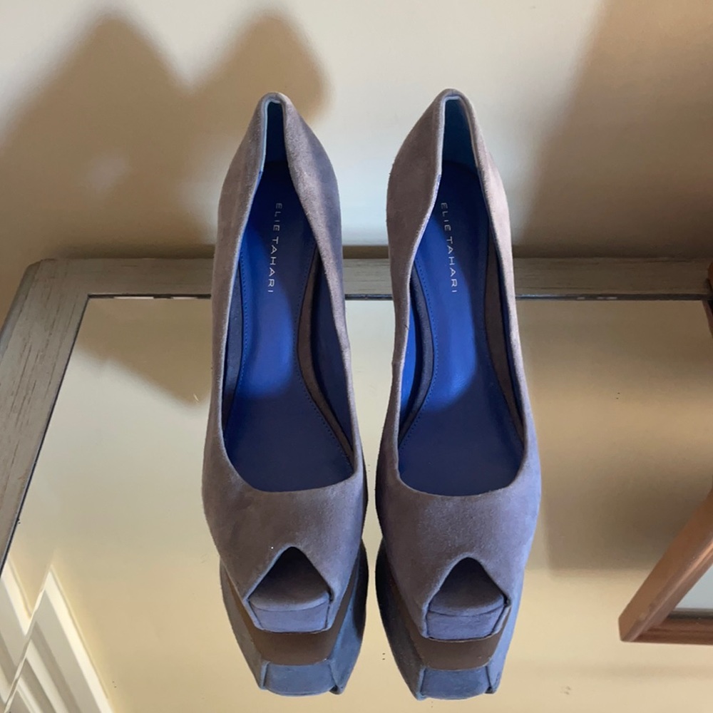 Gray suede Elie Tahari peep toe pumps platform heel.